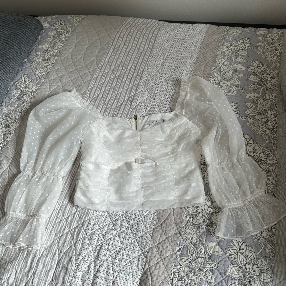Lush crop top
Mesh sleeve
Size small
Sweetheart neckline

Never worn, NWOT